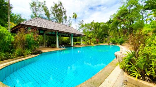 Poolen vid eller i närheten av Tropical garden