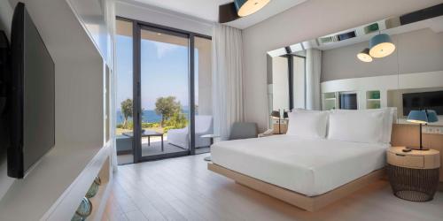 Kama o mga kama sa kuwarto sa Susona Bodrum, LXR Hotels & Resorts