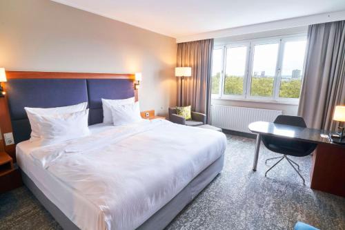 Gulta vai gultas numurā naktsmītnē Radisson Blu Hotel Dortmund