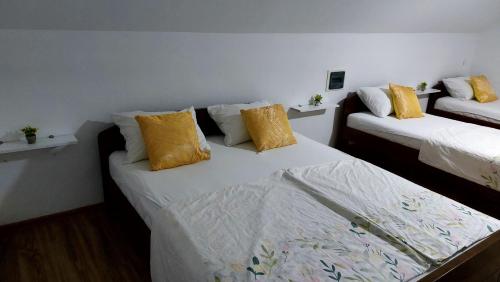 A bed or beds in a room at Amar Apartmani,,