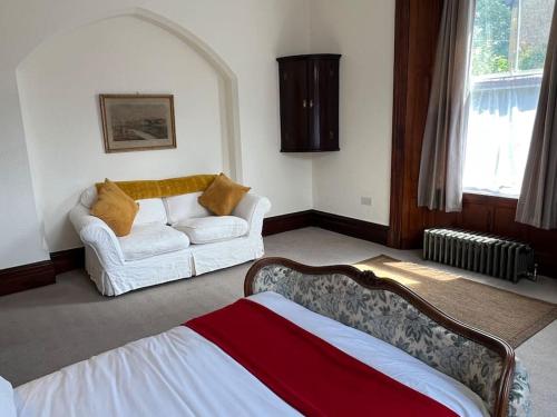 Tempat tidur dalam kamar di Hazlehurst Windermere