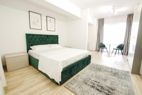 Кровать или кровати в номере Himson-Green Apartment