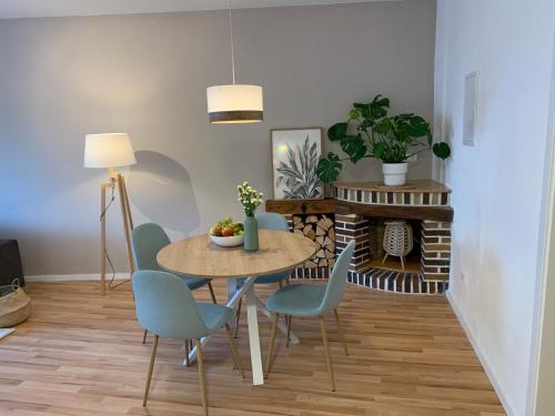 a dining room with a table and chairs at Apartment Brauselay in Cochem