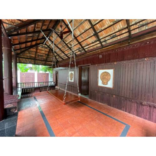 Fotografija v galeriji nastanitve Kerala Heritage Home - Periya Veedu v mestu Neyyāttinkara