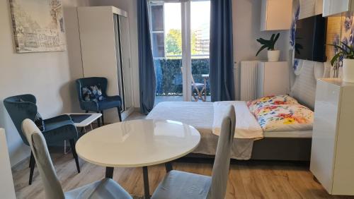 Predel za sedenje v nastanitvi Apartament Wyszyńskiego 10