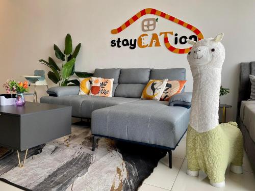 אזור ישיבה ב-Beacon Executive Suite by stayCATion Homestay