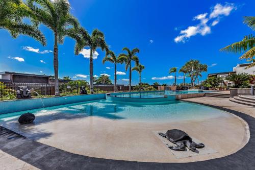 Piscina a Mirage Whitsundays o a prop