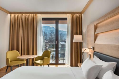 Cama ou camas em um quarto em Radisson Blu Hotel & Residences