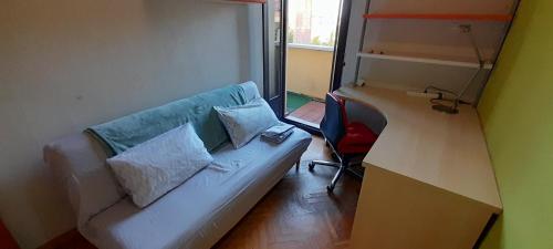 A seating area at Habitación independiente en casa compartida