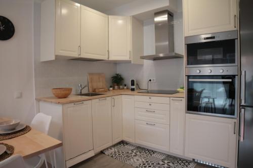 Dapur atau dapur kecil di Modern Apartament al costat del Parc de la Devesa