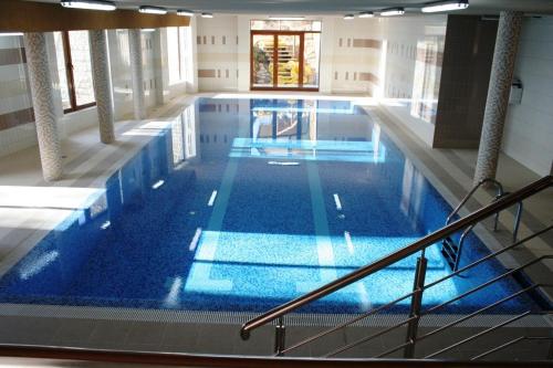 The swimming pool at or close to Mountain Apartments Szymoszkowa SPA Residence