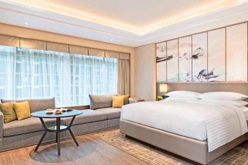 Krevet ili kreveti u jedinici u okviru objekta Marriott Executive Apartments Hangzhou Yuhang