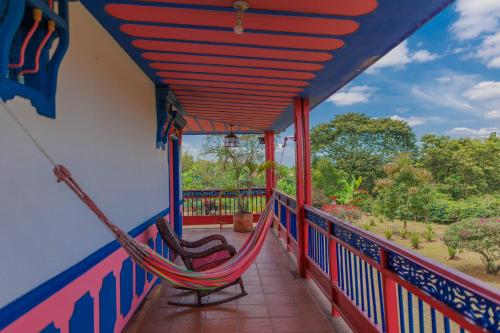 En balkon eller terrasse på Hotel Arrayanes del Quindío