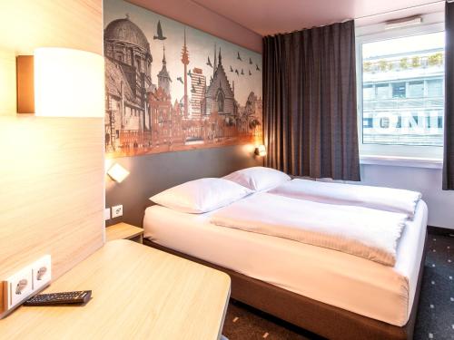 เตียงในห้องที่ B&B Hotel Nürnberg-Hbf