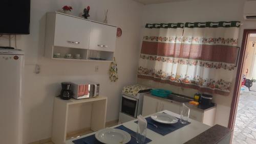 A cozinha ou cozinha compacta de Residencial Tranquilidade Florianopolis