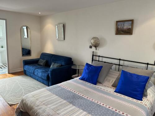 Cama ou camas em um quarto em Villa atmosphère à l'ile verte