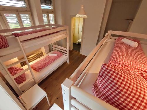 Voodi või voodid majutusasutuse Adventure Hostel Interlaken toas