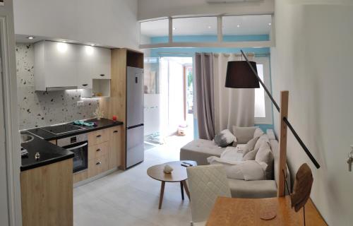 A cozinha ou cozinha compacta de LEFKAS CITY APARTMENTS & SUITES