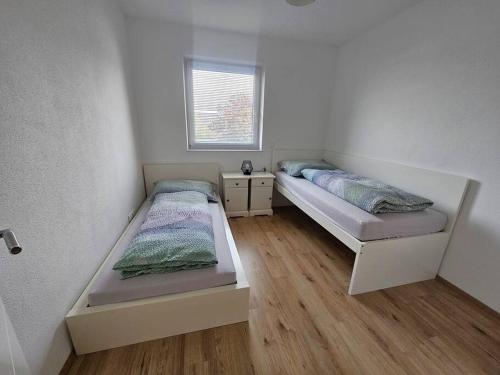 Una cama o camas en una habitación de Gunskirchen - Wels Wohnung