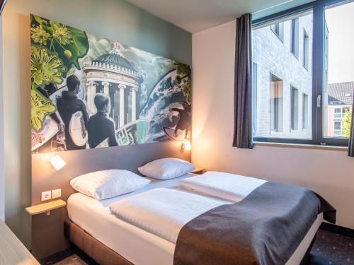 Gulta vai gultas numurā naktsmītnē B&B Hotel München-Trudering