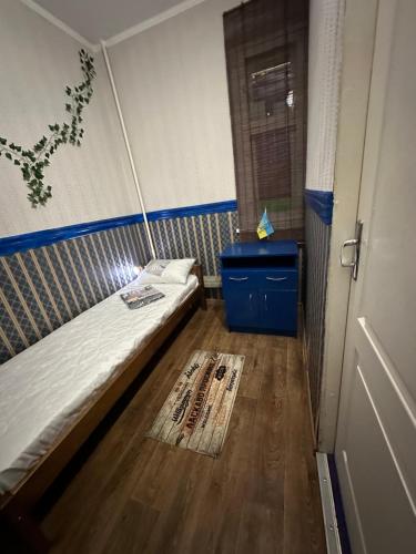 Una cama o camas en una habitación de ArArAt-POZNYAKI Hostel KYIV