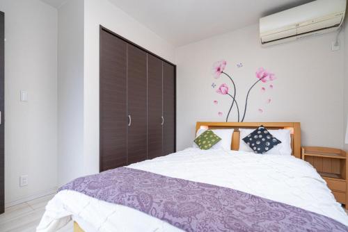 Кровать или кровати в номере 3 BR house 7 mins on foot from Otsuka on the Yamanote Line