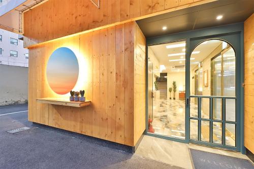 a building with a circular window on the side of it at Hotel Palace Gyeongju in Gyeongju