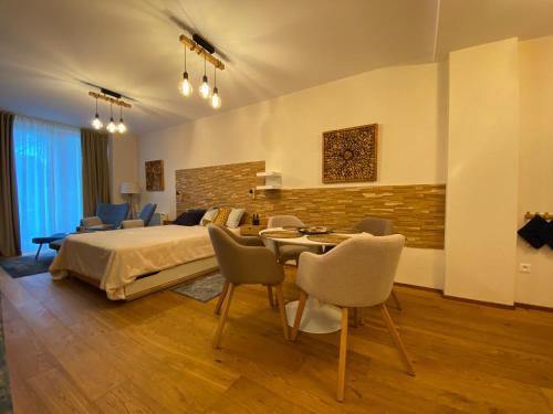 Cama ou camas em um quarto em Apartmány Impresia - Bernard