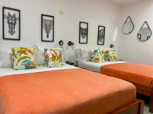 A bed or beds in a room at Makena La Boquilla Beach Hostel