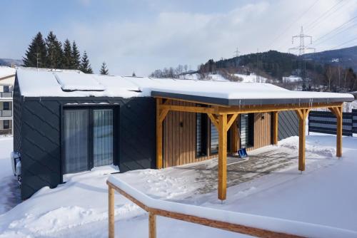 Chalet Stuhleckblick- Ferienhaus direkt an der Piste during the winter