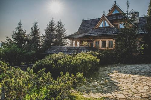 A garden outside Dolisiówka SPA Premium