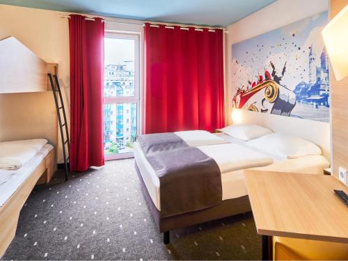 Gulta vai gultas numurā naktsmītnē B&B Hotel Mainz-Hbf