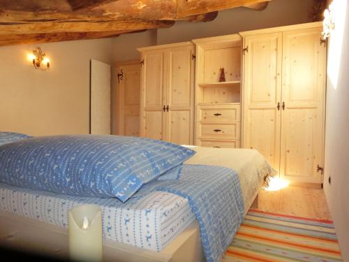 Cama ou camas em um quarto em CORTINA Lodge