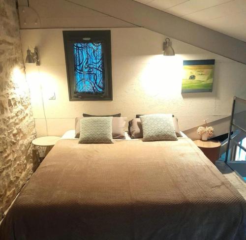 Uma cama ou camas num quarto em Holiday Loft 58