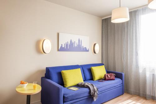 Aparthotel Adagio Access Paris Massy Gare tesisinde bir oturma alanı