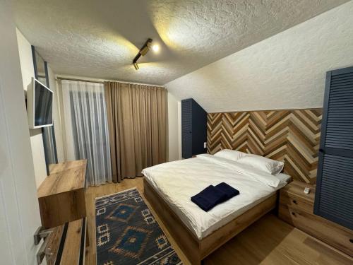 Tempat tidur dalam kamar di Apartments Mandry