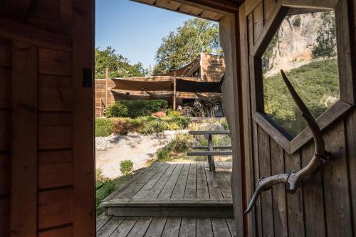 A balcony or terrace at Prehistoric Lodge - Adult Only