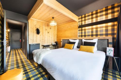 Cama ou camas em um quarto em Mamie Megève