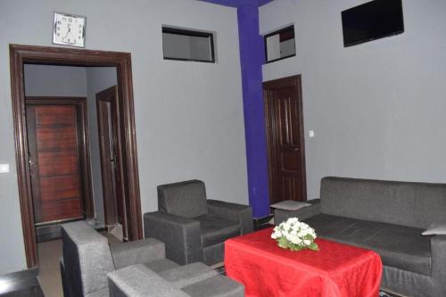 Гостиная зона в Hotel Kangaroo Bujumbura