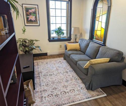 A seating area at Beautiful River View Apt in Wine Country