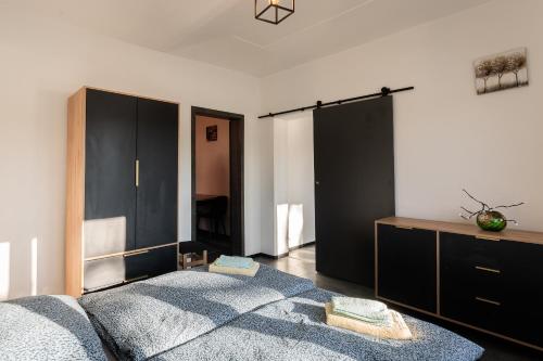 Voodi või voodid majutusasutuse Apartmány Praha-Modřany toas