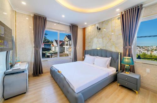 Savio Hotel Trieu Viet Vuong房間的床