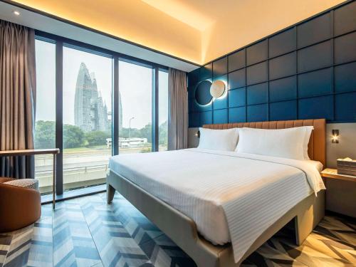 Tempat tidur dalam kamar di Hotel Faber Park Singapore - Handwritten Collection