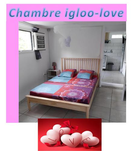 Postel nebo postele na pokoji v ubytování Frédovacances logements le COQUELICOT et le iGloo-LOVE