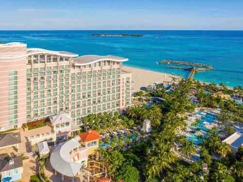 an aerial view of a resort and the ocean at SLS at Baha Mar in Nassau