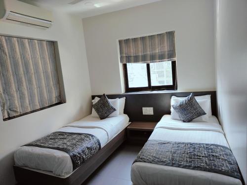 Apollo Guest House में एक कमरे में एक या कई बेड