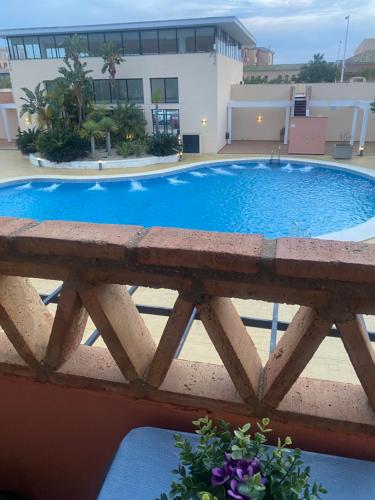 A piscina localizada em Apartamento Punta Umbría Parking Incluido y Piscina ou nos arredores