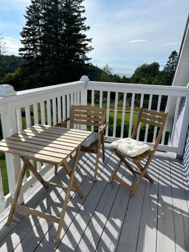 En balkong eller terrasse på Tides Inn Guest Suites