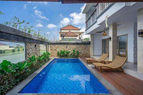 Aditya Guesthouse Canggu में या उसके करीब स्विमिंग पूल