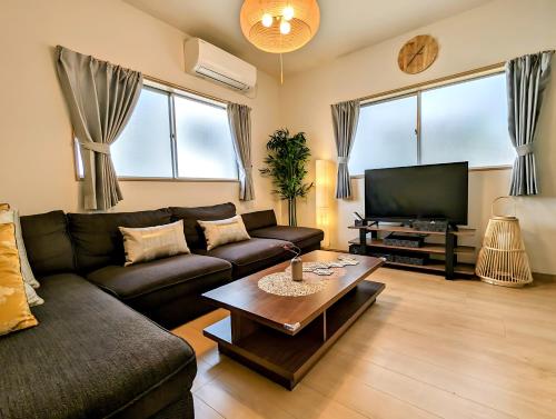 Tsukiyume Kan - House with Parking, 10Mins to USJ, Tennoji, Namba tesisinde bir oturma alanı